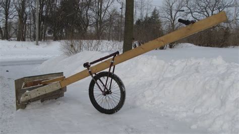 Too Much Snow Here Are 10 Ways To Turn A Bike Into A Snow Plow
