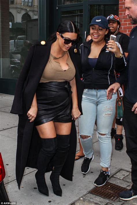 Kim Kardashian Squeezes Her Growing Bump Into Unforgiving Leather Skirt And Ripped Top Daily