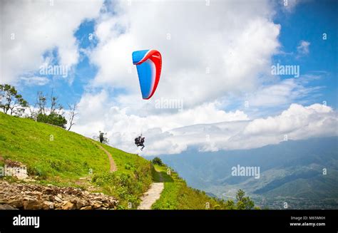 Paraglider Flying Against The Himalayas Everest Region Nepal Stock