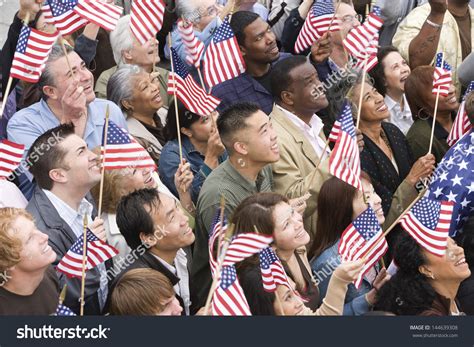 High Angle View Of Happy Multi Ethnic People Holding American Flag