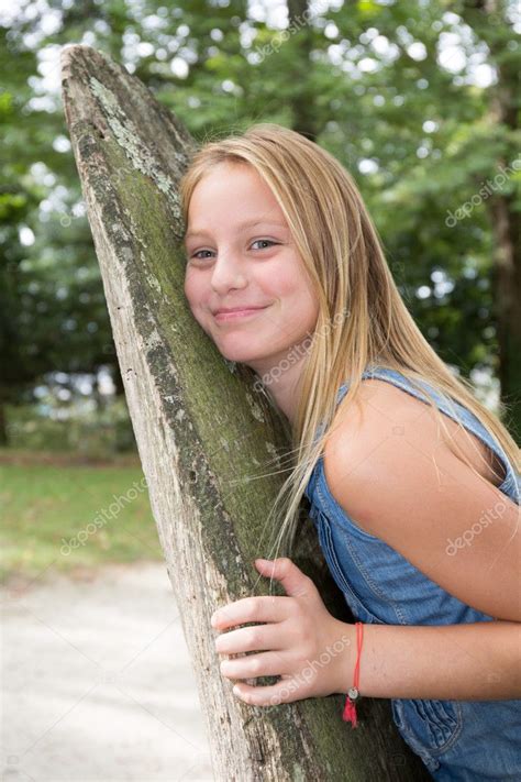 Smiling Young Blond Girl With Long Hair Stock Photo By ©oceanprod 128676262