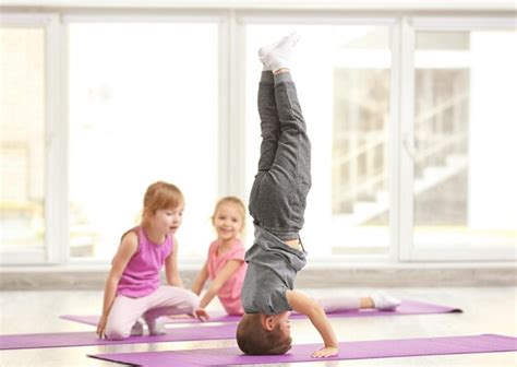 Premium Photo Group Of Children Doing Gymnastic Exercises