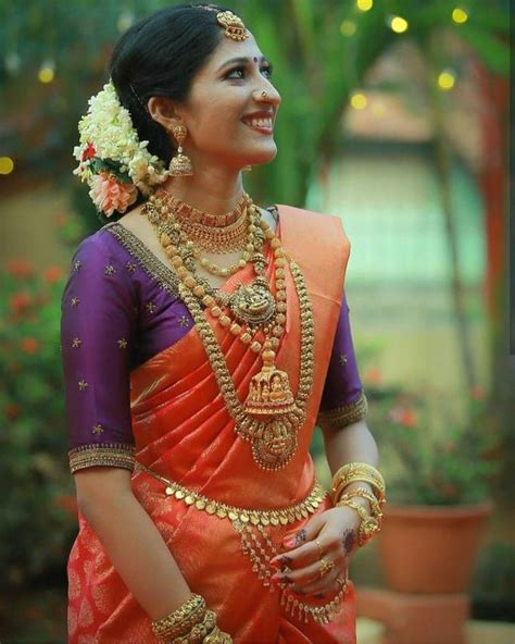 South Indian Bride Indian Bridal Temple Jewelry Jhumkisorange Silk Kanchipuram Sari Braid Wi