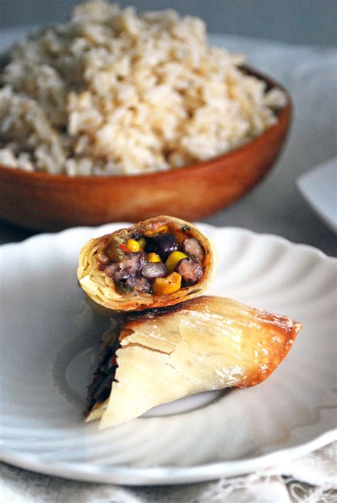 Crispy southwest egg rolls loaded with chicken, beans, corn, bell pepper, cheese, cilantro and lots of mexican spices. Vegetarian Baked Southwest Egg Rolls - The Live-In Kitchen