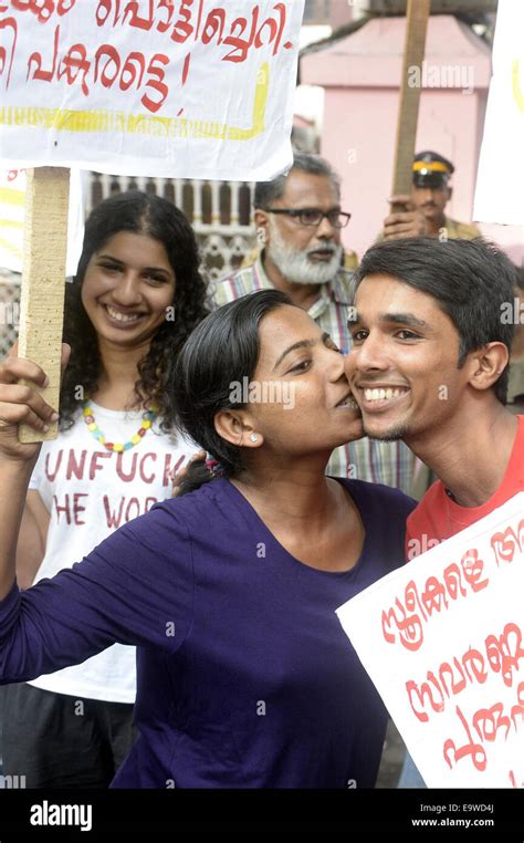 Kochi India 2nd Nov 2014 An Indian Woman Protestor Kisses Another Protestor To Express