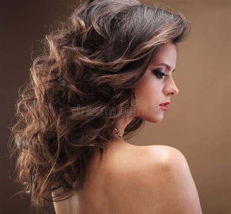 Brunette Girl With Long Healthy And Shiny Curly Hair Beautiful Model