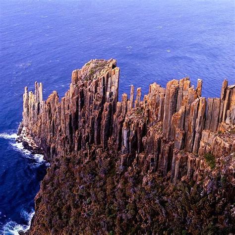 Discover Tasmania On Instagram The Jagged Dolerite Sea Cliffs Of