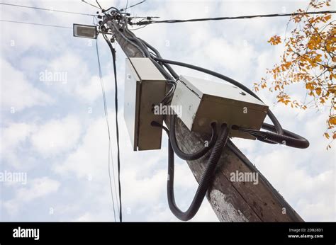 Power Pole With Street Light Electrical Distribution Boxes And Wires