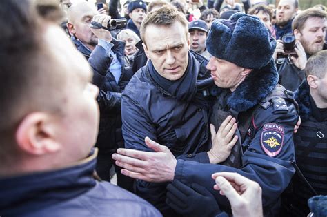In This Photo Provided By Evgeny Feldman Alexei Navalny Is Detained By Police In Downtown