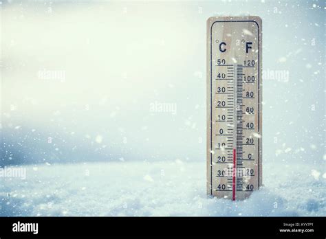 Thermometer On Snow Shows Low Temperatures Under Zero Low Temperatures