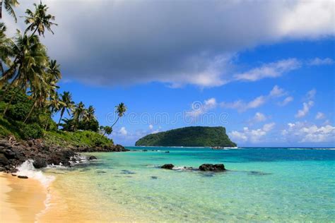 Paradise Island Tropical Beach In Pacific Ocean With Turquoise Water