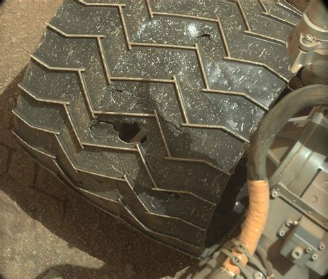 The image shows where the. Mars Rover Curiosity Dealing with Wheel Damage