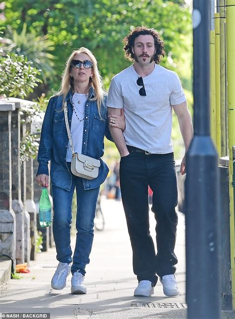 aaron taylor johnson 32 enjoys stroll with wife sam 56 after entering race trends now