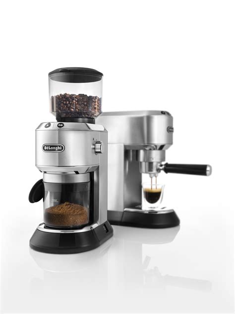 The machine will automatically start grinding and then brewing coffee at the selected time. New high-end coffee machine, Delonghi Dedica. | The ...