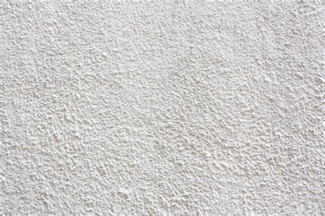 Stucco Wall White Stucco Textured Wall Background With Natural Light