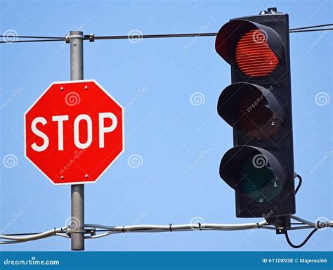 Stop Sign And Red Light At The Road Crossing Stock Photo Image Of