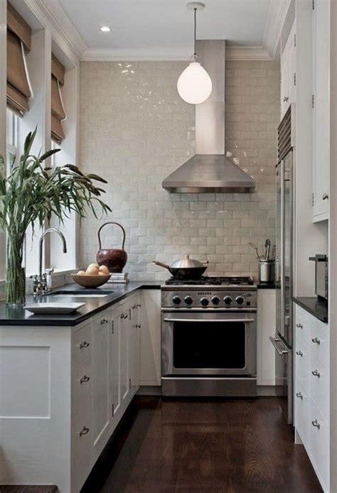 These small modern kitchens showcase different types of cabinets, countertops, and backsplash to help you decide which one you like best. Marvelous Smart Small Kitchen Design Ideas No 56 - DECOREDO