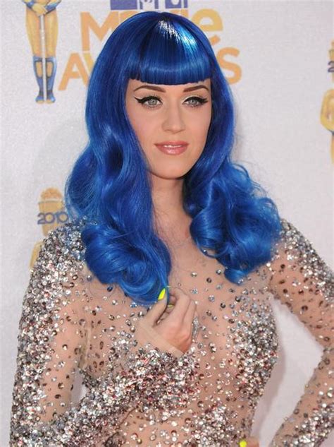 Back then, she had her signature shiny black hair (often worth with some extravagant accessory in it) and since then, we've seen her transform her hair from black to pink to blue to platinum blonde and just about any other color you can think of. Katy Perry with blue hair - Changing Styles: Katy Perry ...