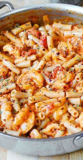 Using a small paring knife, remove the vein along the back of each shrimp and rinse under running water. Spicy Shrimp Pasta in Garlic Tomato Cream Sauce - this ...