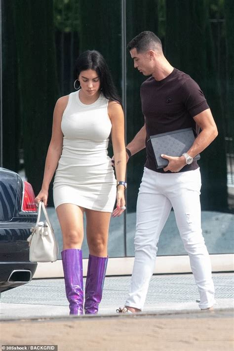 georgina rodriguez wows in a cream dress and purple boots as she steps out with cristiano ronaldo