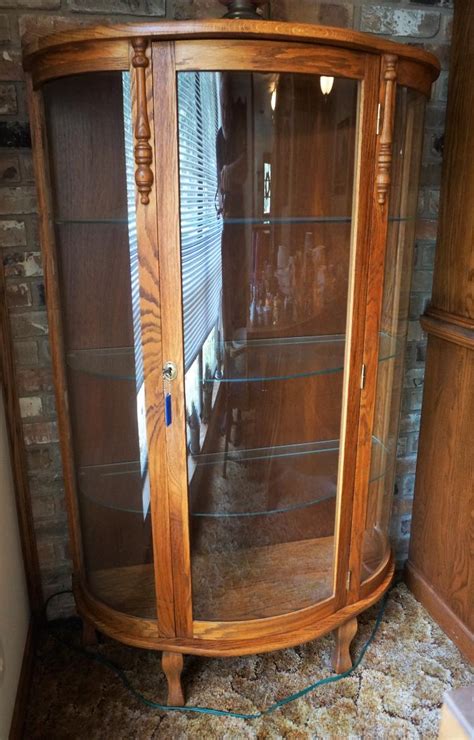 Mirrored curio cabinets create an illusion of a larger space with their reflection. Sold Price: Curved glass curio - August 3, 0117 10:00 AM CDT