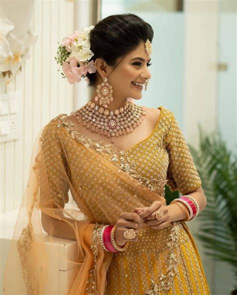 20 Wedding Perfect Lehengas We Spotted On Real Brides Recently Wedbook Yellow Lehenga Red