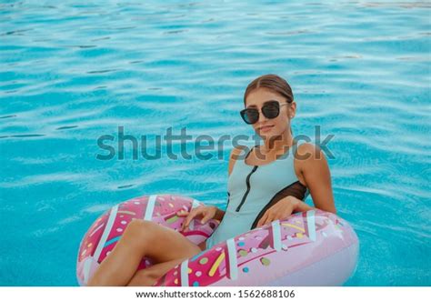 sexy girl blue bikini swimming on foto de stock 1562688106 shutterstock