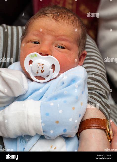 Baby Sucking A Dummy Hi Res Stock Photography And Images Alamy
