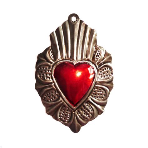 The idea is that the physical heart of jesus is a symbol of his divine love for humanity. Mexican sacred heart - Traditional tin exvoto from Mexico ...