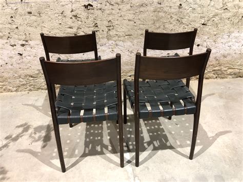 Suite de 4 chaises design italien 1960 en palissandre et similcuir