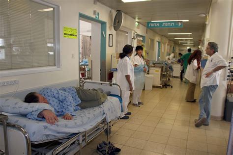 Overloaded Hospitals Tell Sick To Stay Away The Times Of Israel