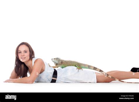 Girl With Her Iguana Stock Photo Alamy