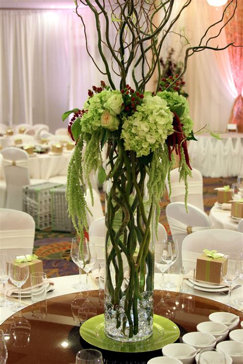 Tall Arrangements Of Budding Curly Willow With Collars Of Light Green Hydrangea Hanging