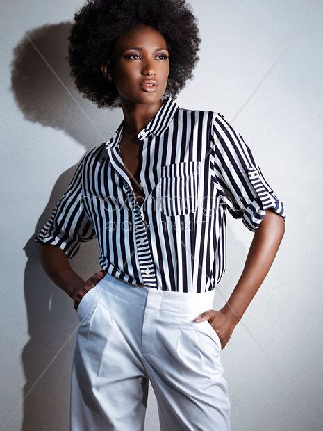 Photo Of African American Woman In Black And White Stylish Clothes