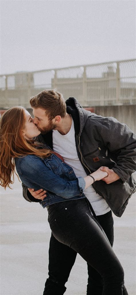 Man Kissing Woman During Daytime Iphone Wallpapers Free Download