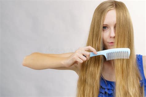 Woman Combing Long Healthy Blonde Hair Stock Image Image Of Shiny