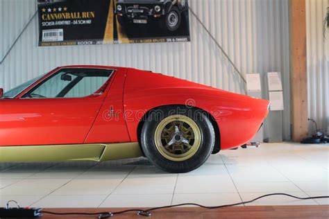 Red Lamborghini Miura Sv Behind With Golden Rims And Bottom Editorial