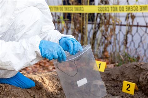 Forensic Science Specialist Work At A Crime Scene Investigation Stock