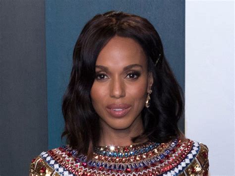 kerry washington sizzles in a form fitting silver dress that shows off her gorgeous curves