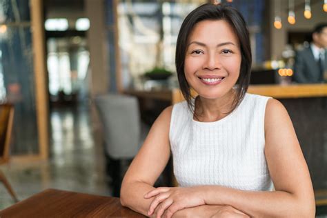 Happy Elegant Asian Middle Aged Businesswoman Smiling Portrait
