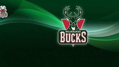 The Milwaukee Bucks Logo On A Green And Black Background With Wavy Lines In The Foreground