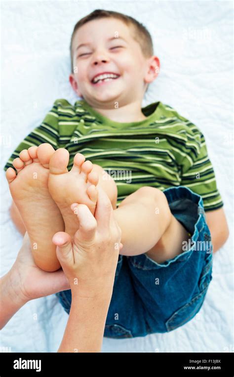 Boy Feet Tickled Hi Res Stock Photography And Images Alamy