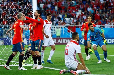 World Cup result: Spain 2-2 Morocco; Spain win Group B after stoppage-time Iago Aspas goal 