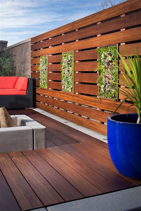 Raised Deck With Foliage In Wood Retaining Wall Hgtv