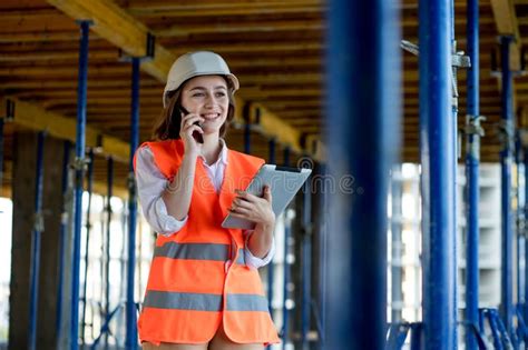 Female Construction Engineer Architect With A Tablet Computer At A