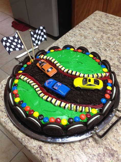 It can also be used as a racing track. Hot wheels birthday cake, Race track cake, Cars birthday ...
