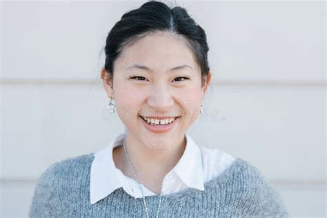 Portrait Of Young Beautiful Asian Woman Smiling At Camera Stock Image