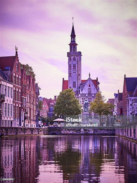 Jan Van Eyckplein Church In Bruges Belgium Stock Photo Download Image