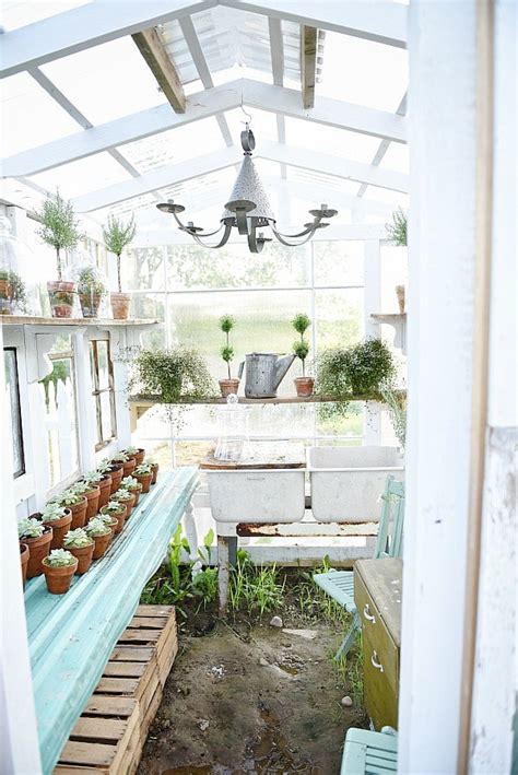 How to build a greenhouse from used windows or storm doors. DIY Window Greenhouse - Liz Marie Blog