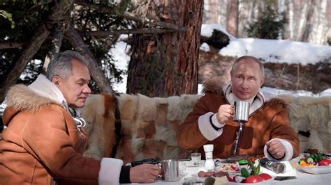 Vladimir Putin Poses In Sheepskin On Snowy Siberian Retreat As Tensions Increase With Us World
